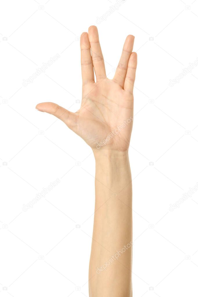 Vulcan salute. Woman hand with french manicure gesturing isolated on white background. Part of series