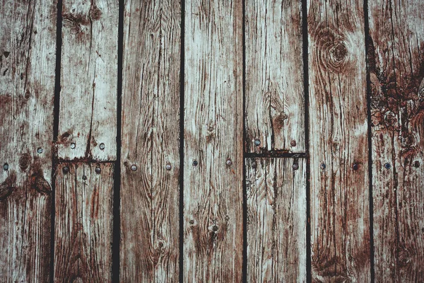 Pranchas de madeira vertical cerca calçadão — Fotografia de Stock