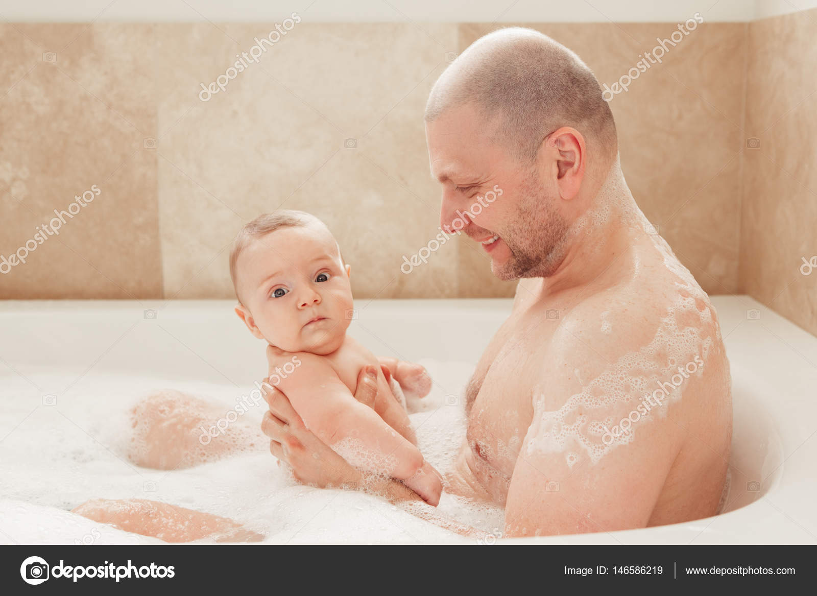 Father taking bath together with baby Stock Photo by ©AnoushkaToronto
