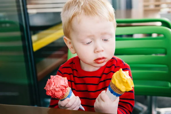 Adorable boy holding ice cream — Stock Photo, Image