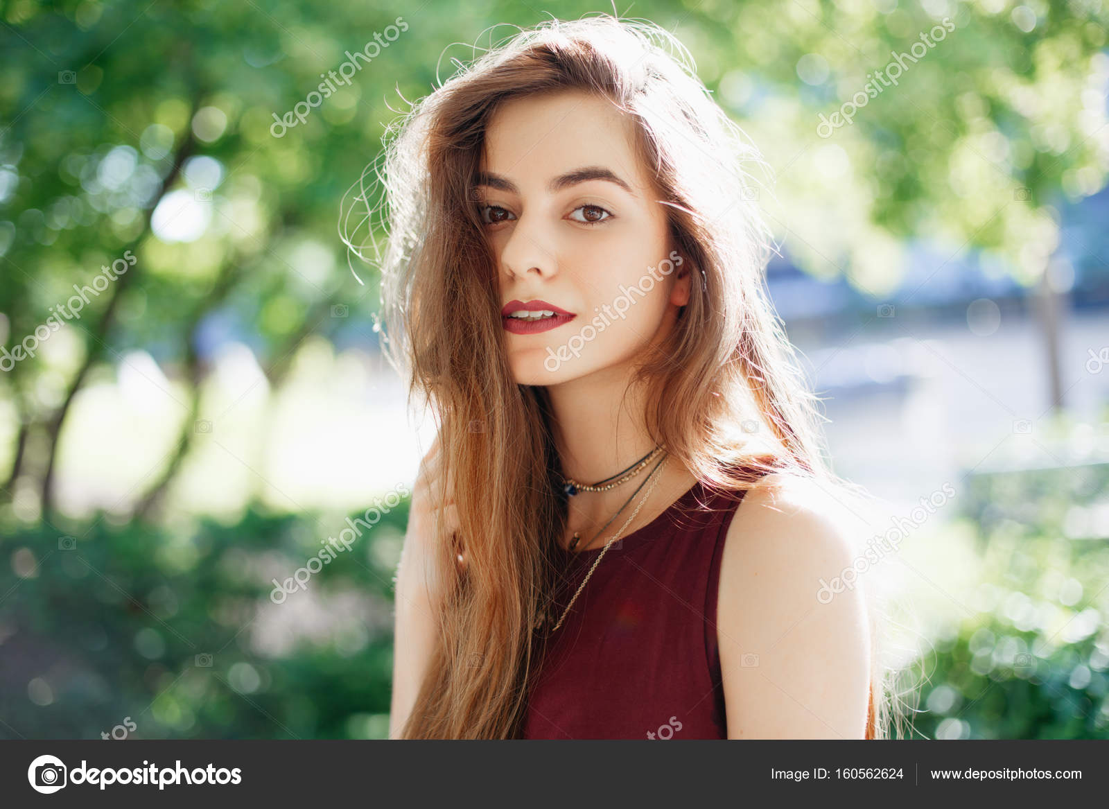 Woman With Long Hair And Brown Eyes Stock Photo