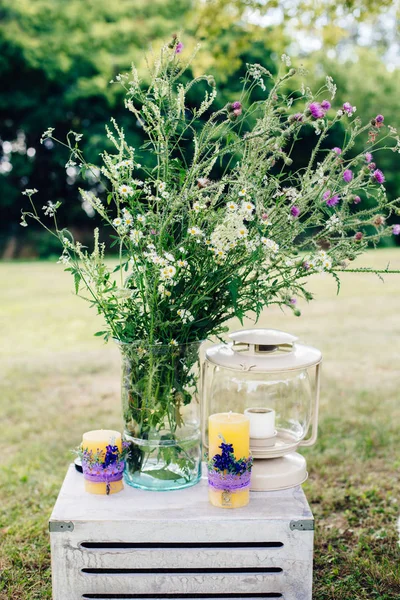 Camomile flowers in glass jar