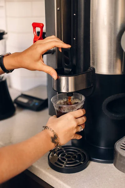 Barista hands making coffee