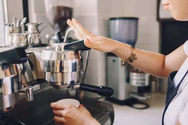 Barista hands making coffee