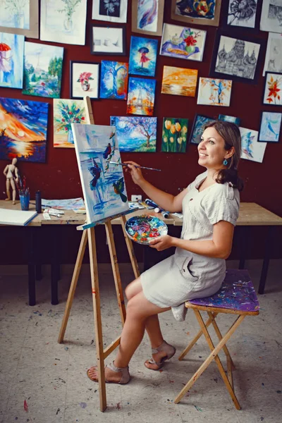 female artist in art studio