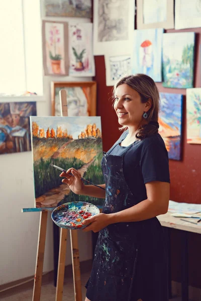 female artist in art studio