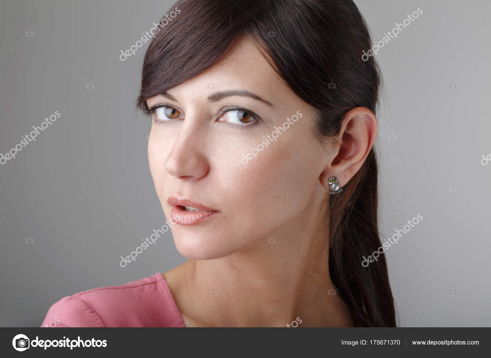 Closeup of a fresh and young beautiful woman isolated on white