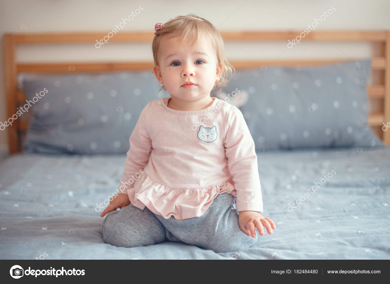 Portrait Cute Adorable Caucasian Blonde Smiling Baby Girl Blue