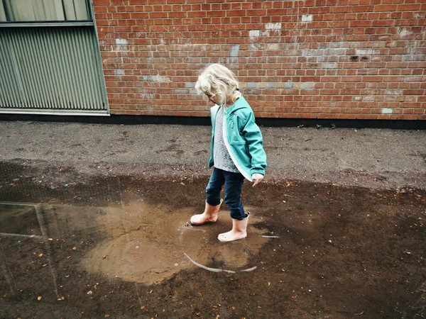 Preschool Girl Jumping Muddy Puddle Seasonal Spring Summer Kids Activity — Stock Photo, Image