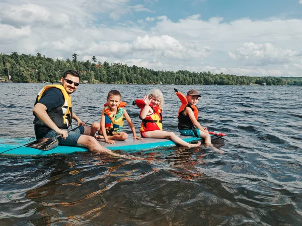 Father Kids Swimming Paddle Surf Board Lake River Dad Children — Stock Photo, Image