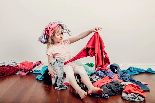 Kid Playing Clothes Head Cute Caucasian Girl Sorting Clothes Adorable — Stock Photo, Image