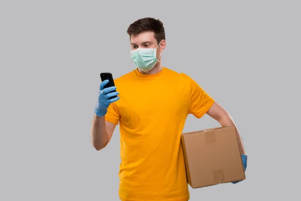 Delivery Man Wearing Medical Mask Gloves Using Phone Box Hands — Stock Photo, Image