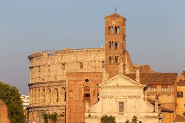 ROME, ITALY - AUGUST 10, 2019: view of ancient Rome, Imperial Fora and Colosseum
