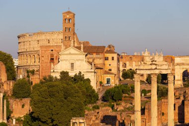 ROME, ITALY - AUGUST 10, 2019: view of ancient Rome, Imperial Fora and Colosseum