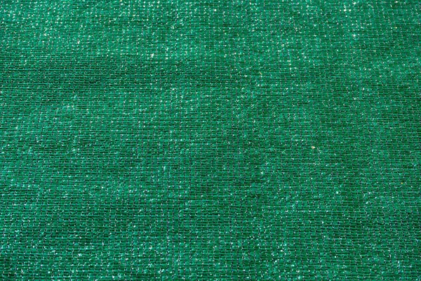 green fabric to cover a fence, privacy concept