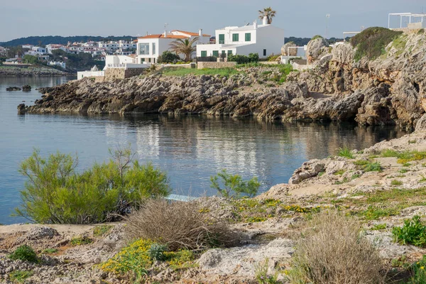 Calm sea, houses on the edge of the rocks with beautiful views