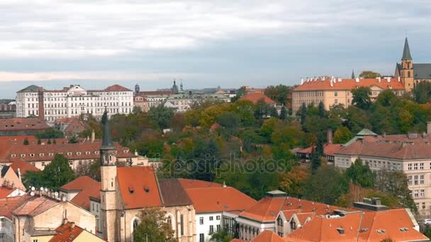 Aerial view of the Old Town architecture with red roofs in Prague , Czech Republic. St. Vitus Cathedral in Prague. — Stock Video