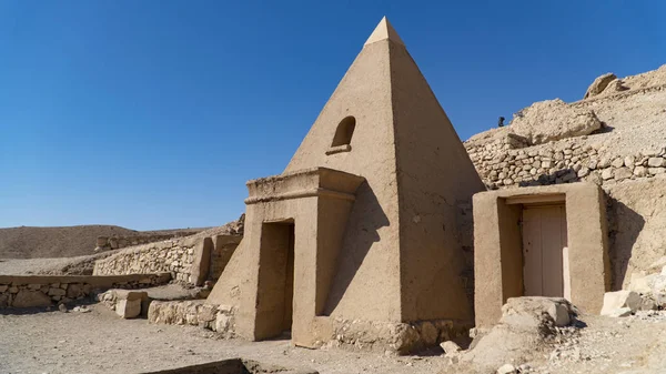 Luxor, Egypt: Deir el-Medina, is an ancient Egyptian village which was home to the artisans who worked on the tombs in the Valley of the Kings during the 18th to 20th dynasties of the New Kingdom of Egypt