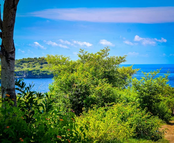 Beautiful Angel\'s Billabong view. Sharp dramatic rocks and crashing waves at the entrance to Angel\'s Billabong on Nusa Penida, wonderful Angels Billabong at Nusa Penida, Bali Indonesia, Angel\'s Billabong is natural infinity pool on the island