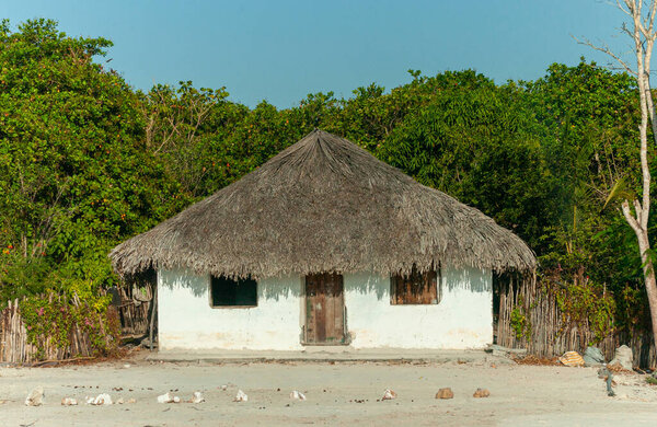 Typical thatched house, where part of the native population lives in the Lencois Maranhenses National Park, Barreirinhas, Maranhao, Brazil on October 13, 2006
