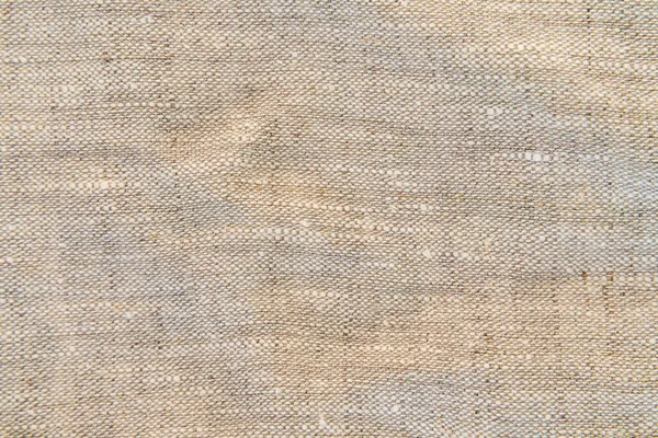 light natural linen texture for the background. natural fabric linen texture for design. sackcloth textured. White Canvas for Background. Image has shallow depth of field.