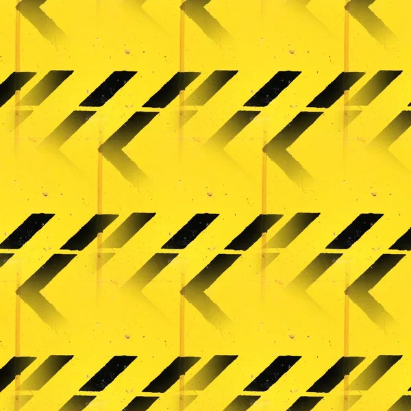 multiple black direction arrow and chevrons on vivid yellow textured painted wall diverse patterns and designs