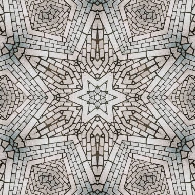 dikdörtgen beyaz yaya yolu blokları ve siyah havan topu geometrik yıldız etkisi desenleri oluşturur