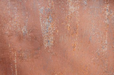 Arka plan için paslı metal yüzey boyası. Paslı kırmızı boyanmış metal..
