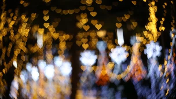 Corazón Bokeh, luz de Navidad en la noche — Vídeo de stock