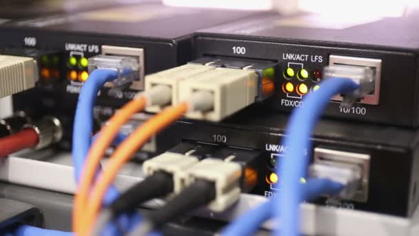 Details from loaded and working network switch with fiber media converter(focus light status) — Stock Video