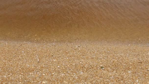 Nahaufnahme Wasserwelle Auswirkungen Sand Hintergrund. High Definition 1080p — Stockvideo