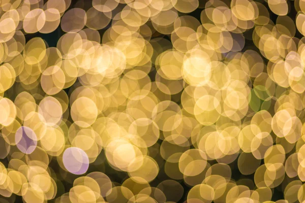 Abstract golden sparkle background De-focused bokeh abstract Christmas copy space Shimmering blue spotlights defocused golden lights, New Years, disco party