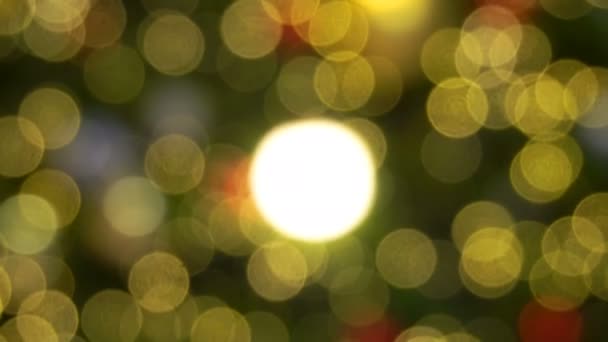 クリスマスの黄金の光が背景に動いている — ストック動画