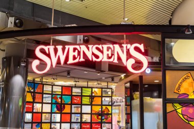 Nakhon Ratchasima, Thailand January 29, 2020. Swensen's ice cream sundae shop at Terminal 21 shopping mall in downtown Korat. Swensen's is an ice cream sundae brand and old from USA. clipart