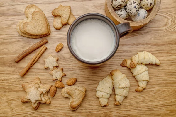 Background with homemade cakes, fragrant cookies. Cookies in the form of hearts, stars, coffee beans, spices, almonds close-up. menu concept, Home baking. Full size, cookiespeanuts