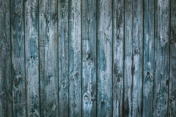 old blue wooden texture banner background with scuffs, scratches, peeling paint. copy space