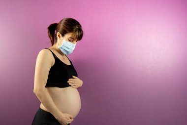 Pregnant woman worried for child with mask because of Coronavirus COVID-19 clipart