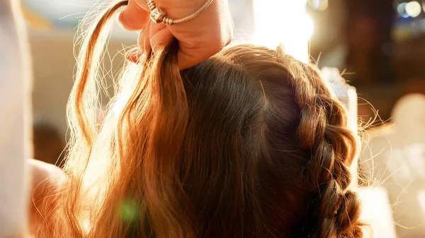 Female model getting her hair dressed — Stock Photo, Image