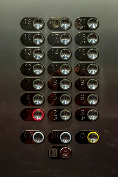 Buttons for Elevator multi-storey building. Buttons with number one enabled 1