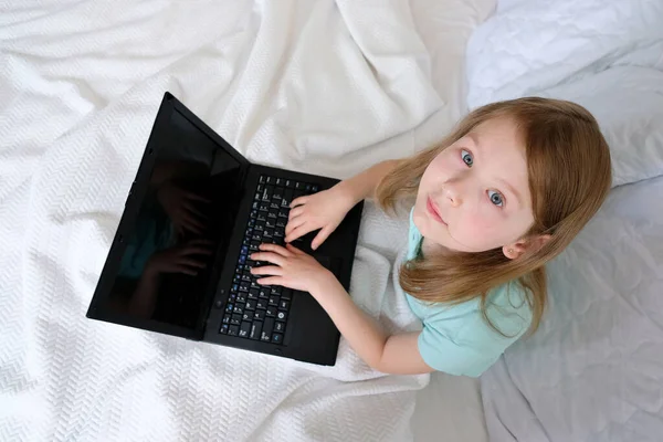 Little Girl Sitting Laptop Doing Homework Baby Laptop Bed Stock Picture