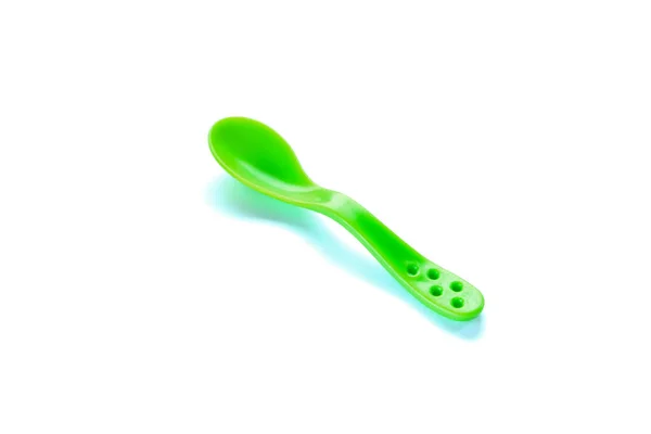 Groene Plastic Lepel Voor Kinderen Geïsoleerd — Stockfoto