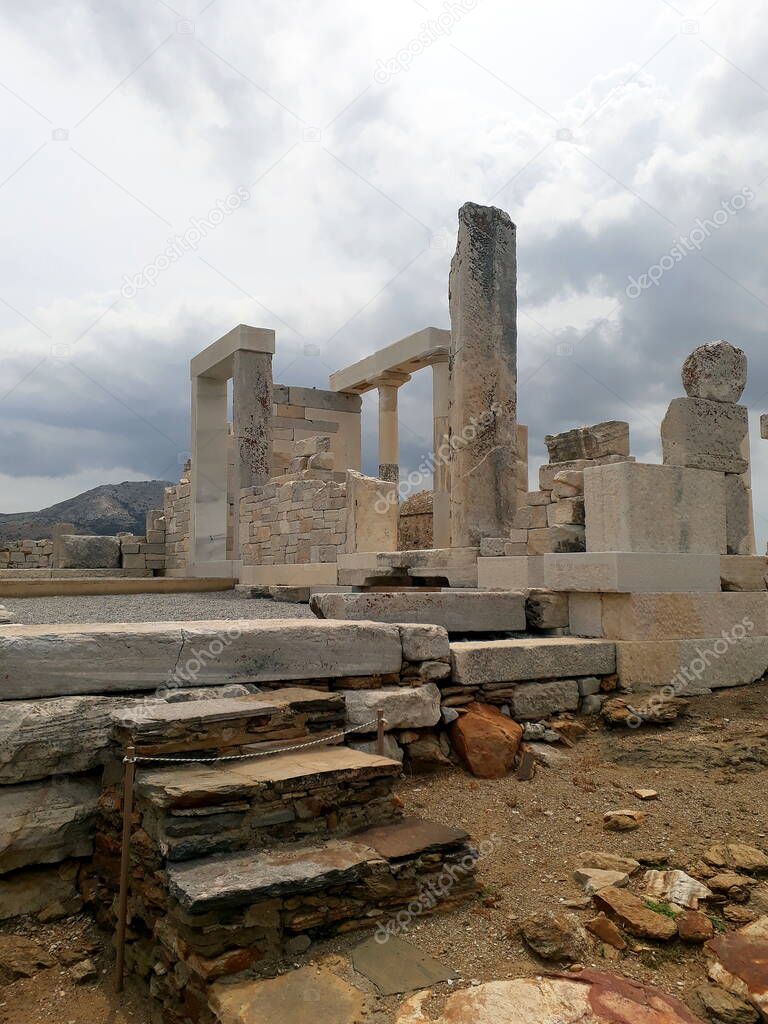 Ruin of Demeter Temple in Naxos with cloudy sky, Greece