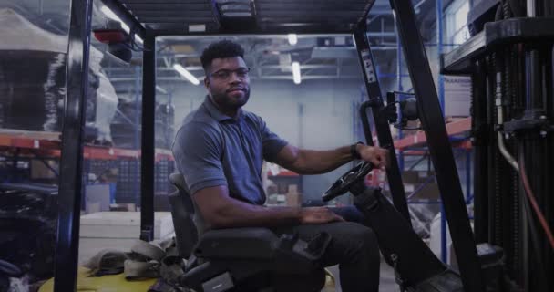 African American Manager Shipping Warehouse Using Forklift — Stock Video