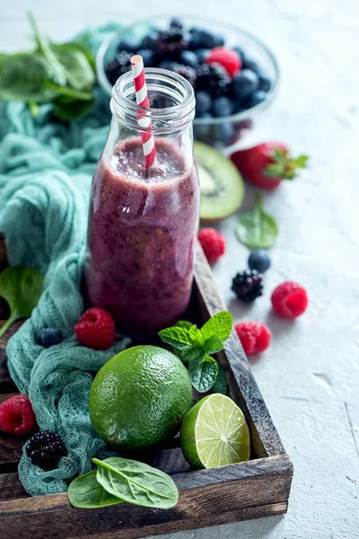 Berry smoothie, healthy detox drink, diet or vegan food concept,