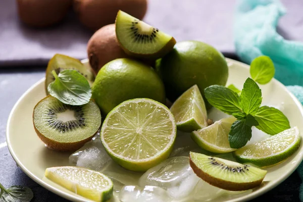 Lime, mint and kiwi, ingredients for refreshing drink, lemonade — Stock Photo, Image