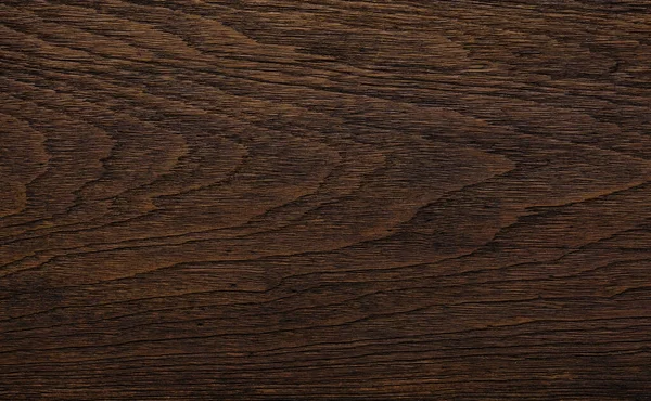 Koyu kahverengi eski ahşap dokular, doğal yapı malzemesi. Yüzey malzemelerini dekore etmek için klasik tasarım..  