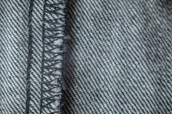 Cucitura Overlock Pantaloni Denim Grigio Dettagli Tessuto Tessuto Messa Fuoco — Foto Stock