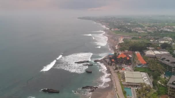 Flying over Mejan Stone Beach in Changu Bali Indonesia — Stock Video