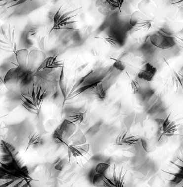 Elleri renksiz, tropik yapraklarla bulanık desenli. 