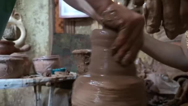 Practicing traditional ceramics pottery making — Stock Video